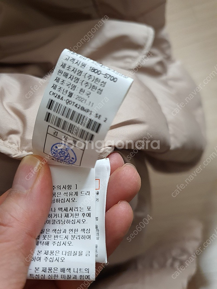 더캐시미어 하이넥 구스패딩55사이즈--6