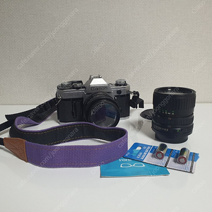 (A급) 캐논 ae-1 필름카메라 + 정품 렌즈 2개(50mm/35-70mm)+ 배터리