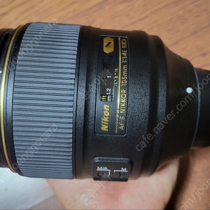 니콘 105 mm f1.4 E ED N 렌즈, B+W F-PRO 필터 포함 판매합니다.