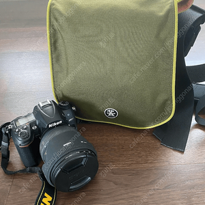 니콘 D7000과 시그마 24-70 렌즈 팝니다.