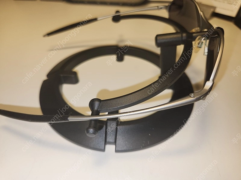 오클리 Oakley E Wire 2.0 Bronze Iridium / 메탈 케이스 이미지