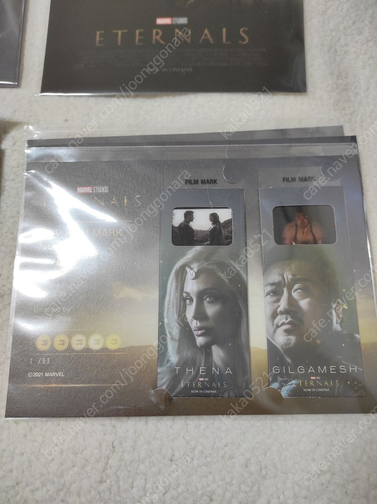 이터널스 굿즈 메가박스 스탠딩 포스터 세트 얼리버드 렌티큘러 포스터 코인 씨지브이 필름 마크 마그넷 이미지