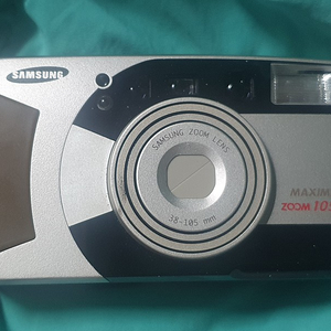 삼성 카메라 필름카메라 MAXIMA 줌 105XL 정면 렌즈 커버가 다 안열려 살짝 터치하면 열립니다