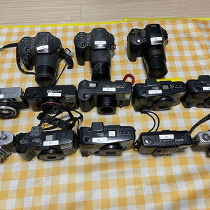 올림푸스 필름카메라 , 수동카메라 , 자동카메라 여러대 판매합니다.