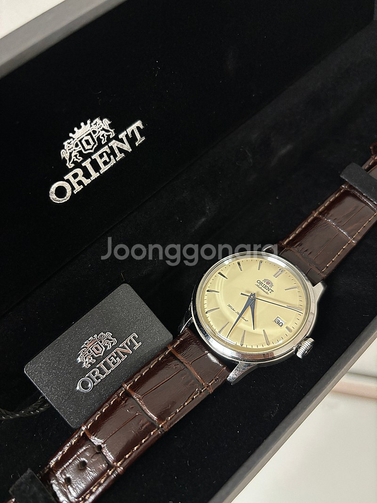 오리엔트 밤비노 크림 38mm 손목시계 팝니다.--5