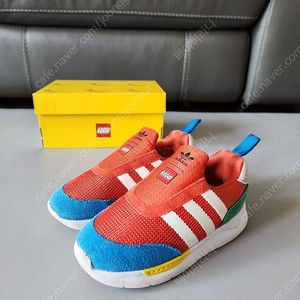 아디다스 키즈 레고 140 슬립온 ZX 360×LEGO 볼드 ORANGE WHITE BLUE