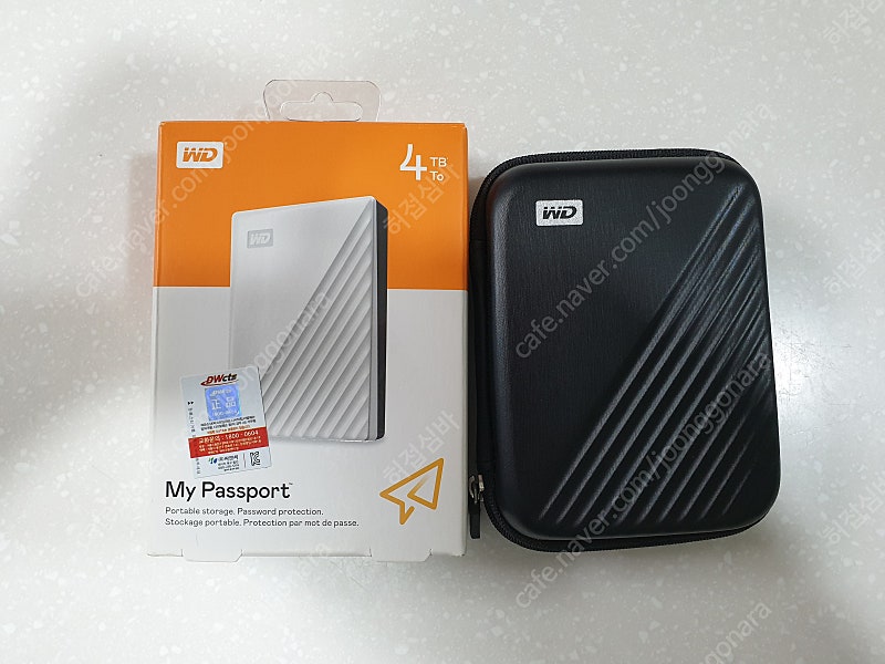 WD New My Passport 4TB 외장하드 + 정품 파우치 팝니다.