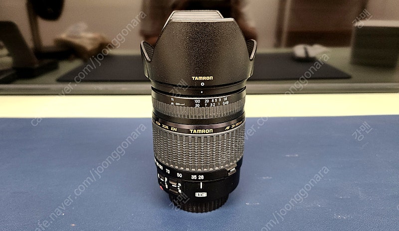 탐론 28-300 줌 렌즈 팝니다.(캐논마운트, UV 필터 + 후드 포함)