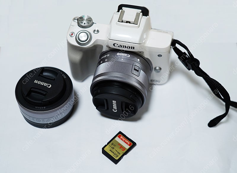 캐논 EOS M50(화이트) 판매합니다. 구성은 카메라, 15-45mm렌즈, 22m렌즈, 배터리, 정품충전기, 카메라가방, 샌디스크 64G메모리, 삼각대 포함입니다. 구입은 1년