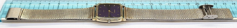 심플한 디자인에 곤색, 보라색 선레이가 신비하게 보이는 라도 정품 사각 시계