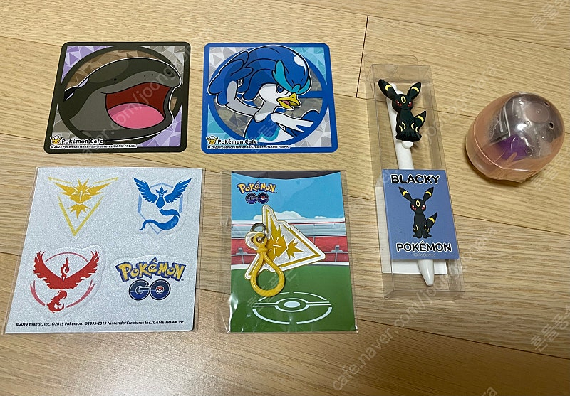 포켓몬스터 굿즈 라프라스 키체인, 피카츄 에코백, 메타몽 애플워치 케이스, 블래키펜, 데스크 매트, 팔찌 등 판매 이미지