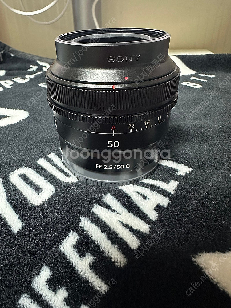 소니 50G(50mm2.5)판매합니다!!!(박스O)--0