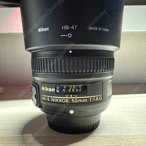 니콘 50mm f1.8g (50.8g)