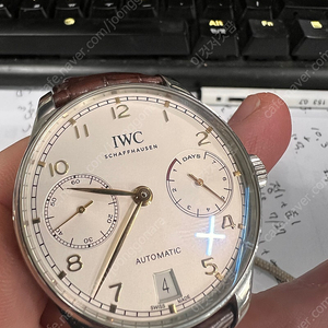 iwc 포르투기저 7days 부엉이