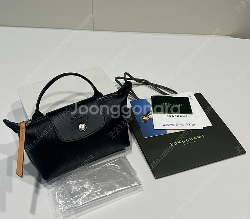 롱샴 르 플리아쥬 시티 핸들 파우치 블랙--0