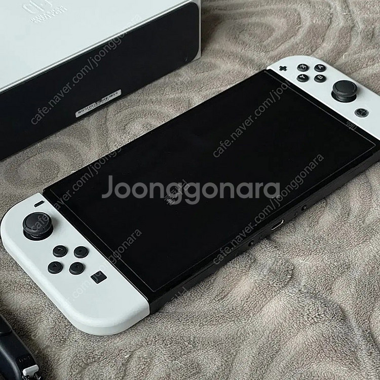 닌텐도 스위치 OLED 화이트 모델입니다--1