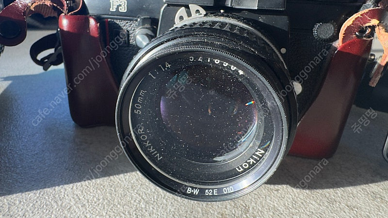 니콘 F3 필름 카메라 + Nikkor 50mm f/1.4 렌즈 +70~210mm 망원렌즈 + SB-12라이트 + ... 이미지