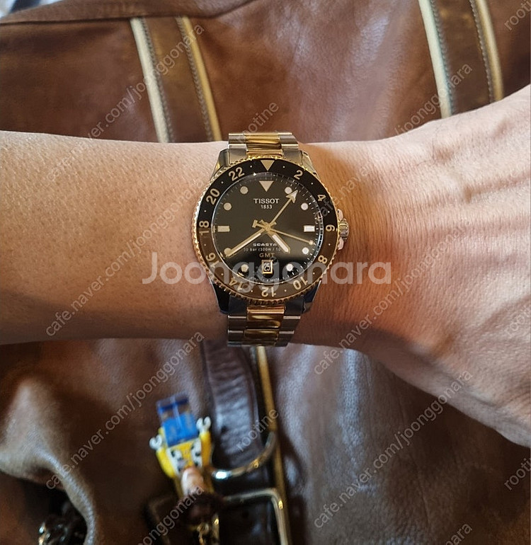 티쏘 씨스타1000 40mm gmt 루트비어 콤비--3