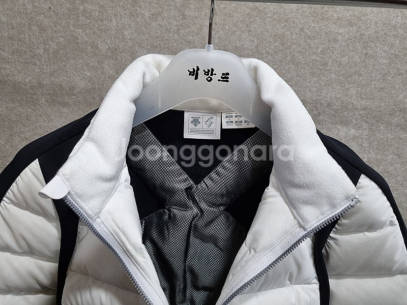 여성 85 데상트 골프웨어 거위털 자켓--3