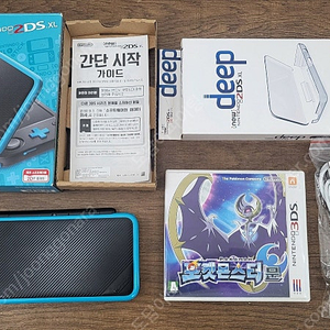 new 2ds xl 블랙 순정제품 판매해요. 포켓몬스터 문 게임 포함 / 포켓몬뱅크 설치됨