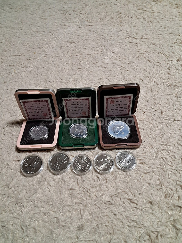 88올림픽 만원1개 오천원2개 이천원2개 천원3개--0