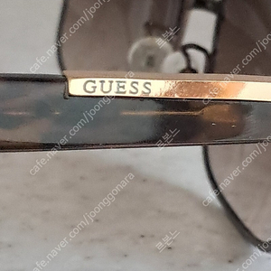 GUESS.선글라스.브라운.7만