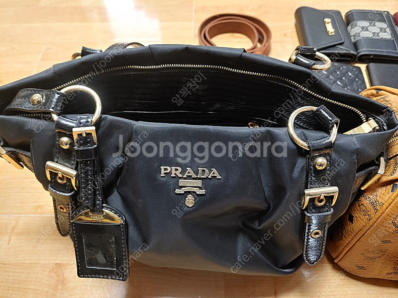 PRADA. GUGGI. LOUIS VUITTON. M...--1