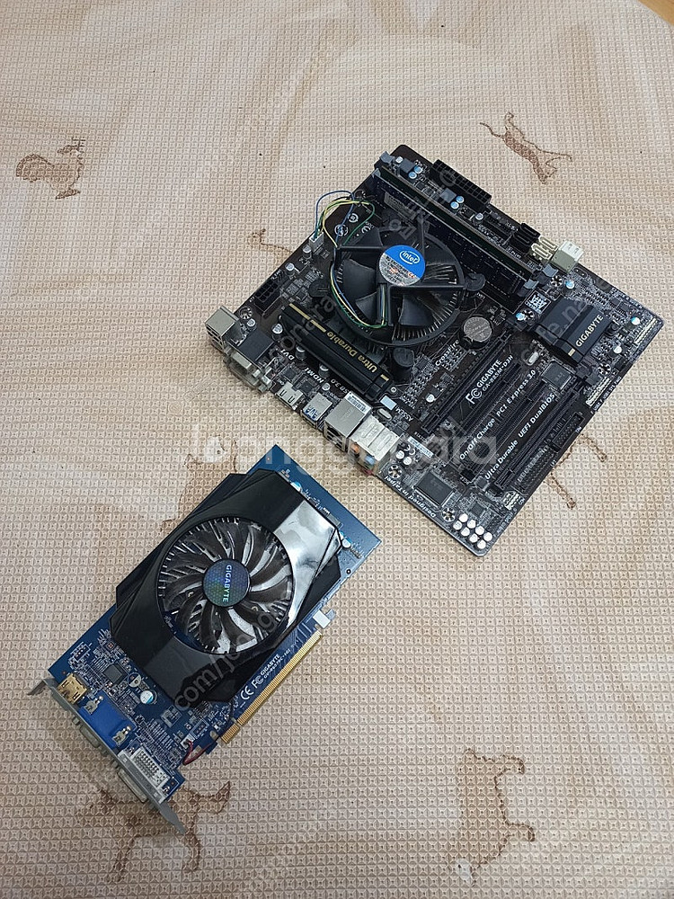 1. Gigabyte ga-b85m-d3h 2.Gigabyte gv-r6570c-1gi--0