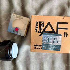 정품 Nikon AF 50.8 D 렌즈+ B.W 필터 세트를 74,000원에 팝니다.