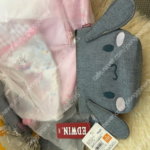 (가격내림)산리오 정품 에드윈 시나모롤 파우치 키티 폼폼프린 쿠로미 39,000원 데님 파우치 마이멜로디 리바이스