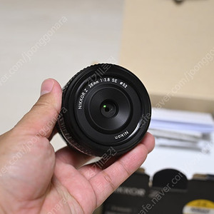 니콘 Z 28mm f2.8 SE 렌즈 거의 새것 팝니다.
