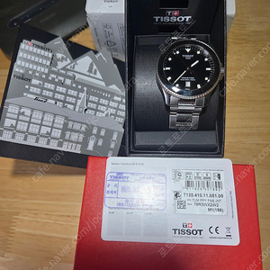 티쏘 씨스타 1000 40mm 검판 쿼츠