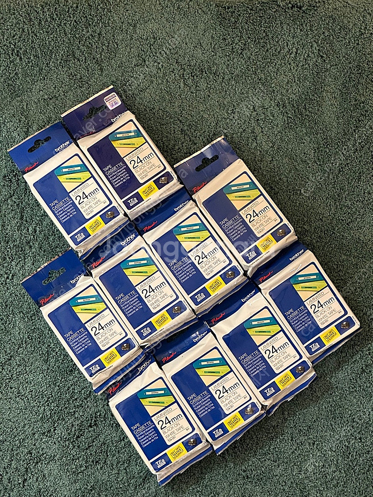 브라더 라벨프린터 카트리지 24mm 흰배경 검은글씨 T...--0