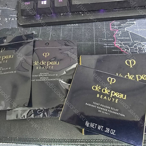 끌레드뽀 보떼 래디언트 파우더 파운데이션 II O10 새제품