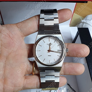 티쏘 PRX 40mm 쿼츠 흰판