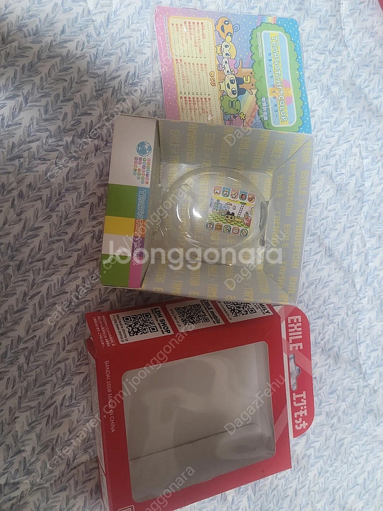 다마고치 오컬 엑자일 레드 팝니다.--2