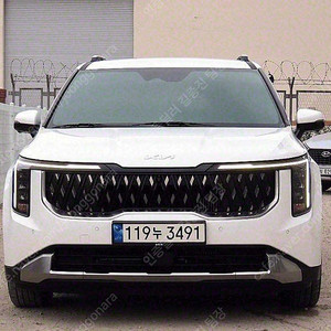 기아 더뉴 카니발 중고 가격 중고 카니발 흰색 2024년식 21,681km HEV 9인승 시그니처 중고차카페