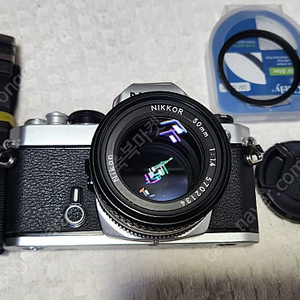 니콘FM(A급), LR44 2개 전기능정상, 니콘렌즈 NIKKOR 50/1:1.4, 스트랩.