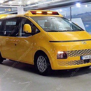 어린이보호차 중고 스타리아 중고차 노란색 2023년식 54,872km 15인승 어린이 보호차량 자동차사이트