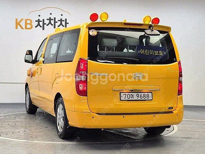 어린이보호차량 더 뉴 그랜드 스타렉스 중고차 노란색 2...--3