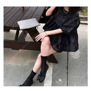 루즈핏 리본 퍼프 반팔 블라우스 - 아이보리