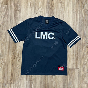 LMC x 엄브로 반팔 져지 100