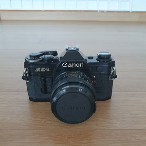 캐논 AE-1 필름카메라 (배송비,렌즈 포함)