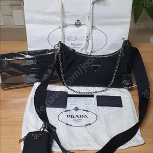 프라다 호보백/크로스백 리에디션 정품S급(보증서O)구찌루이비통고야드샤넬디올보테가베네타입생로랑발렌시아가톰브라운셀린느클러치미우미우가방버버리에르메스명품버킷백호보백크로스백숄더백토트백파우치