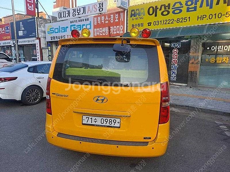 어린이보호차량 더 뉴 그랜드 스타렉스 중고차 노란색 2...--5