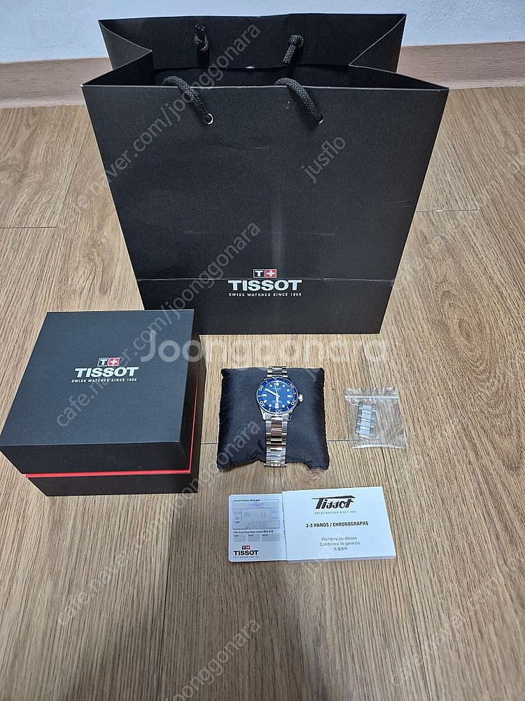 티쏘 씨스타 1000 36mm 블루 T120.210.1...--0