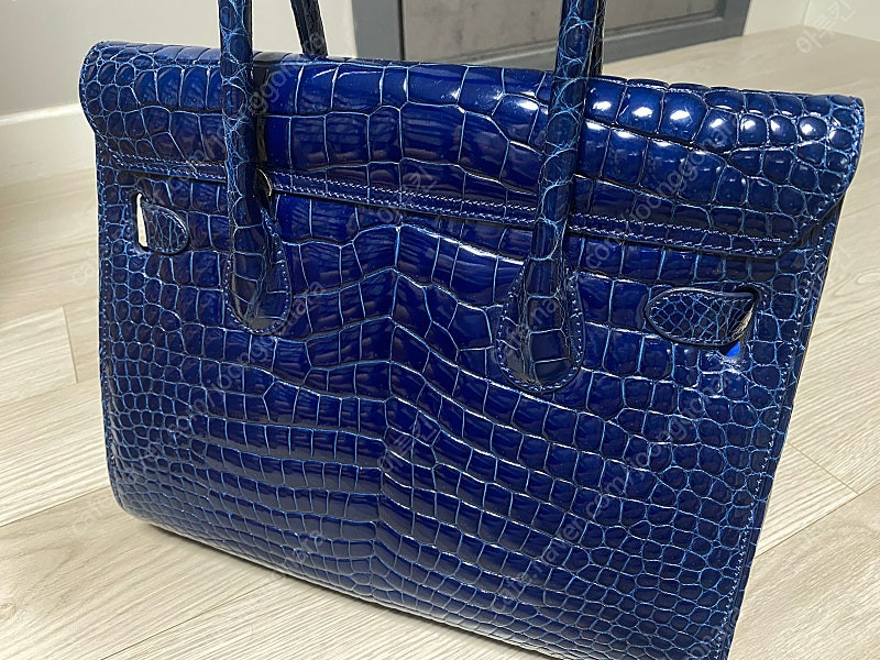 호미가 악어백 팝니다. 이미지