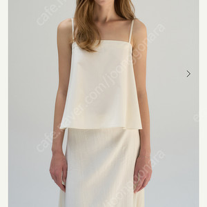 시에 피아 슬리브리스 블라우스