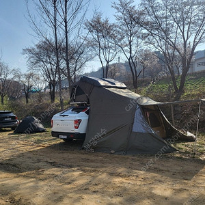 자동 가이아 ACT1루프탑 텐트입니다