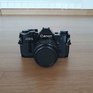 캐논 AE-1 필름카메라 (배송비,렌즈 포함)